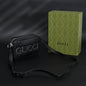 Gucci Black Leather Embossed Logo Belt Bag
